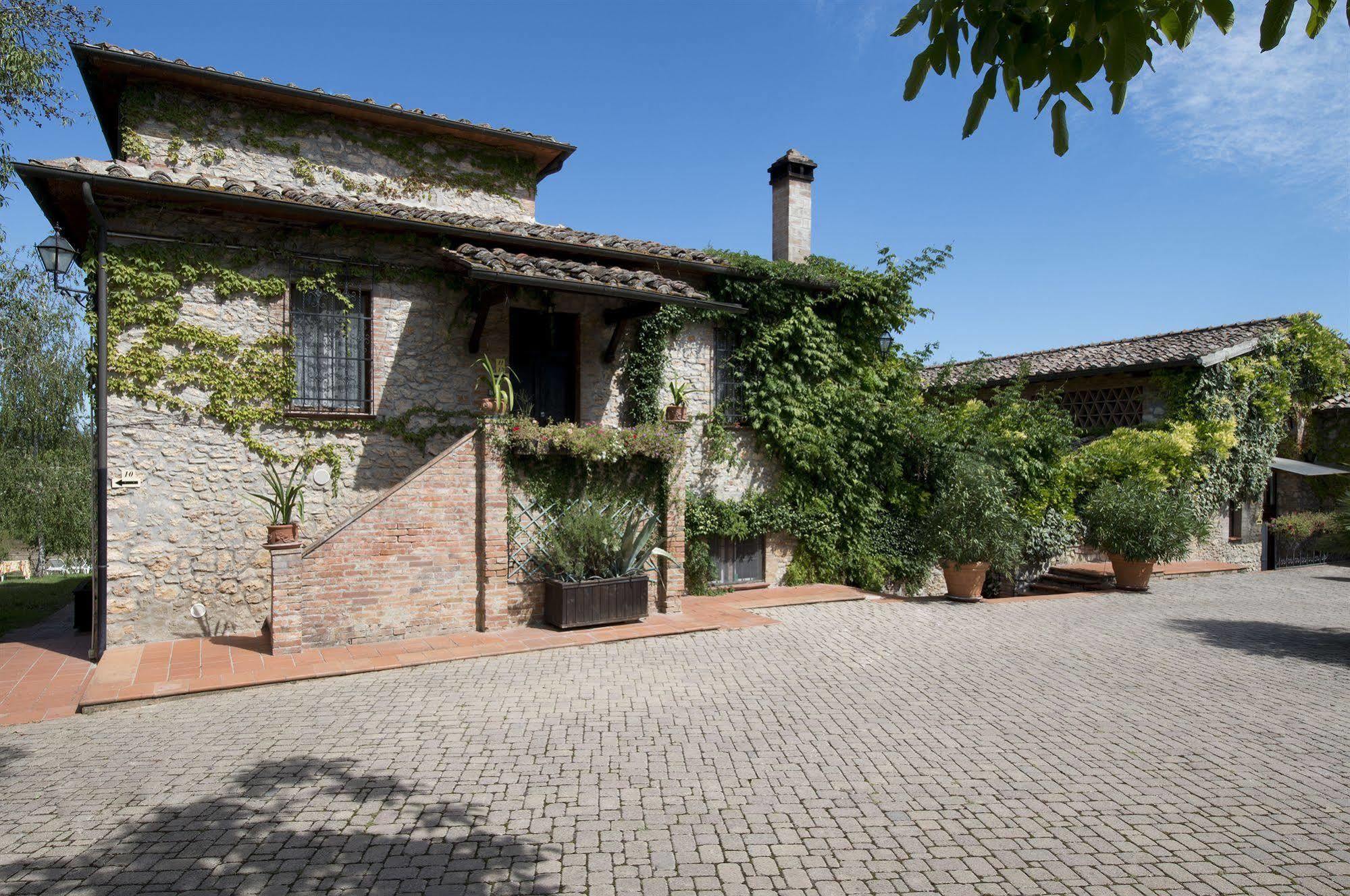 Hotel Il Pietreto Colle Val D'Elsa Bagian luar foto